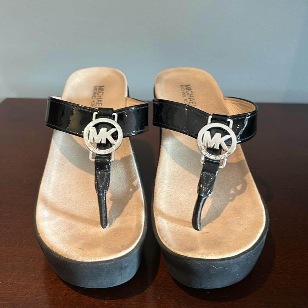 Michael Kors Black Patent Leather Wedge Sandals.